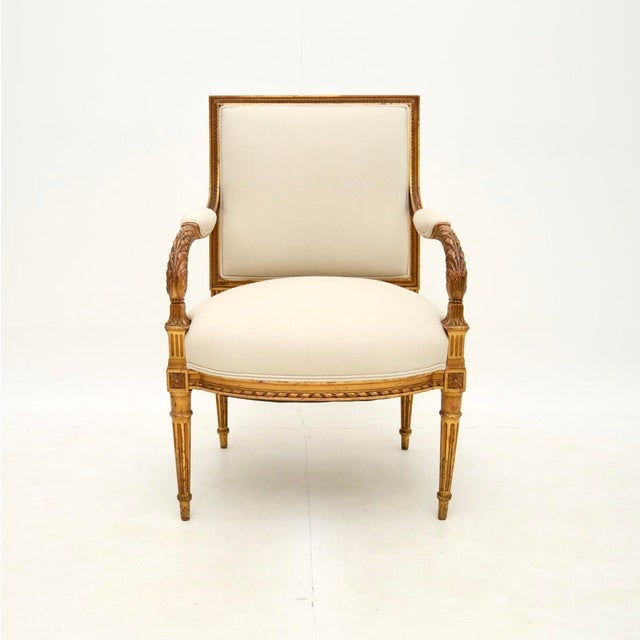 A beautiful antique French carved gilt wood armchair, dating from around the 1860-1880 period. This is of very good...