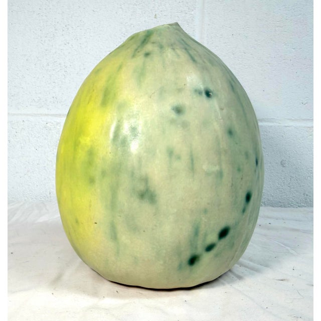 This vintage handmade Patricia Garrett figural squash or melon pottery vase done in 1996 is a unique addition to any...