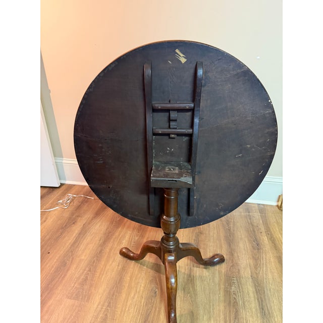 Beautiful antique pie table with a rich honeyed patina. One slight crack on top looks like it has been there forever and...