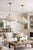A beautiful pair of French bronze and crystal chandeliers, crafted circa 1960. These elegant vintage chandeliers combine...