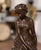 Decorate a desk, library shelf, or lady’s office with this elegant antique bronze sculpture titled La Cruche Cassée (The...