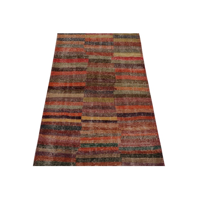 This vintage 4x7 rug is a new addition to Rug & Kilim’s commemorative Mid-Century Pasha Collection. This line is a...