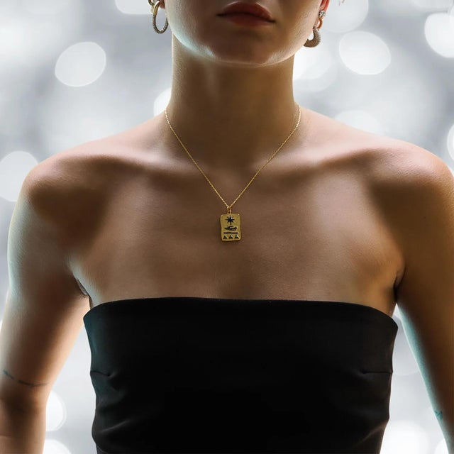 Egyptian All In Your Hands Sun Gold Necklace is a dazzling fusion of celestial elegance and meaningful design. The pendant...