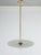 Industrial style pendant light with a circular white flat disc shade, a polished brass rod, and an exposed bulb. This...