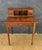 Elegant Louis XVI style writing desk dating to the early 20th century. The desk features a rectangular writing surface...