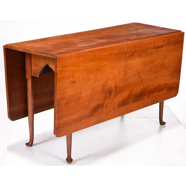 probably New Jersey, 18th century, solid figured fruit wood throughout, probably applewood, 29-1/2 x 53-1/4 x 20 in....