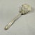 From Wallace & Sons Silver Company New York, in the Somerset pattern, a sterling silver tomato server, produced in 1913 –...