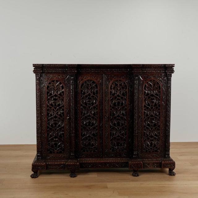 Exceptional 19th century sideboard crafted in rosewood and mahogany featuring a dramatic grained rosewood top and sides on...