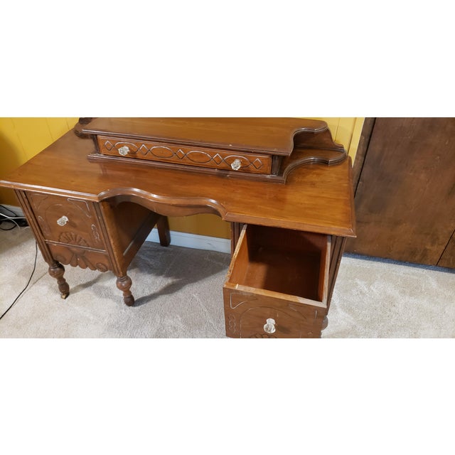 Beautiful Vanity from the 1920's. Probably had a mirror attached but did not come with the desk. One could certainly add a...