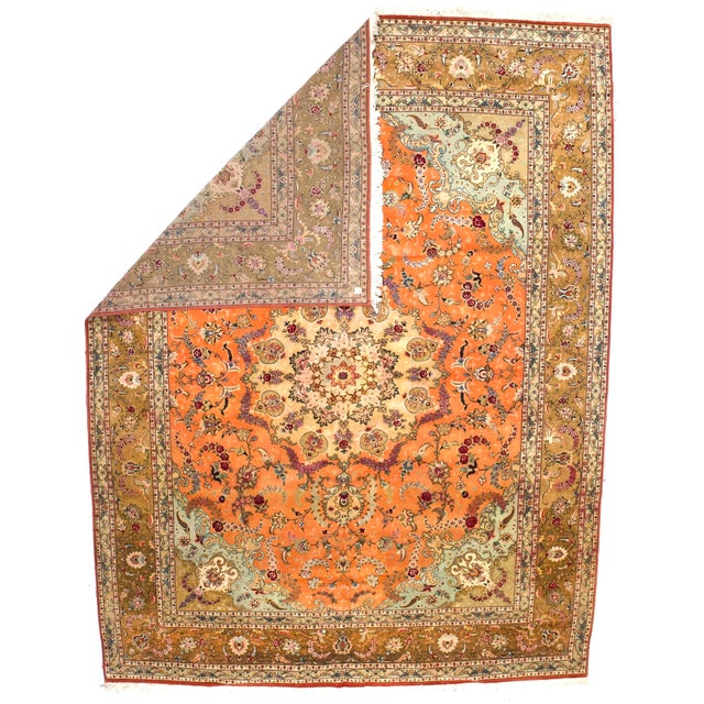 Extremely fine Persian Tabriz Wool & Silk Foundation Rug 9’10” x 12'11". The enormous output of carpets and scatters in...