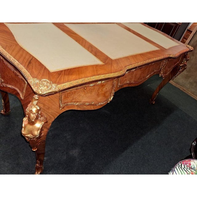 Large Louis XV style flat desk after Charles Cressent in marquetry and gilt bronze Dimensions: Height: 82 cm Width: 172 cm...