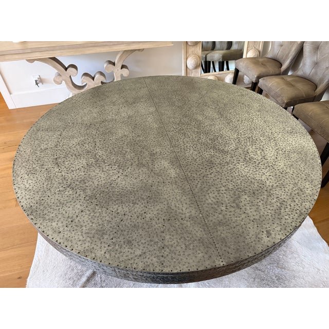 Wood / metal (hammered zinc) covered table.