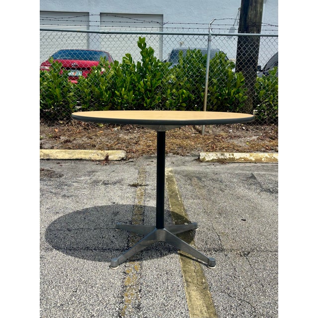 Vintage 1970s Eames Aluminum Group Contract Table designed by Charles and Ray Eames for Herman Miller. Features a round...
