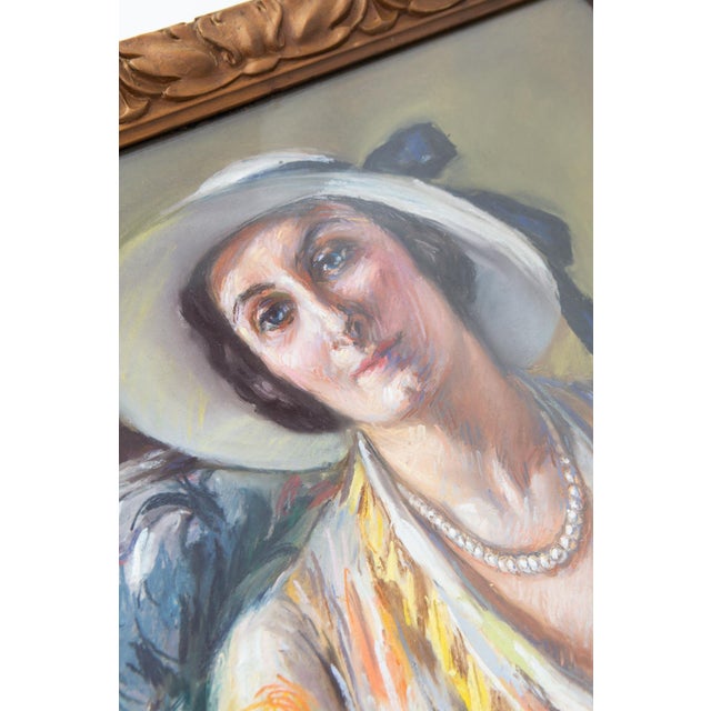 Female portrait in pastel by the French artist Fanny Billaud, dated 1932. The artwork retains its original wooden frame,...