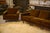 1960s living room set comprising a three-seater sofa and two matching armchairs. Upholstered in warm brown velvet with a...
