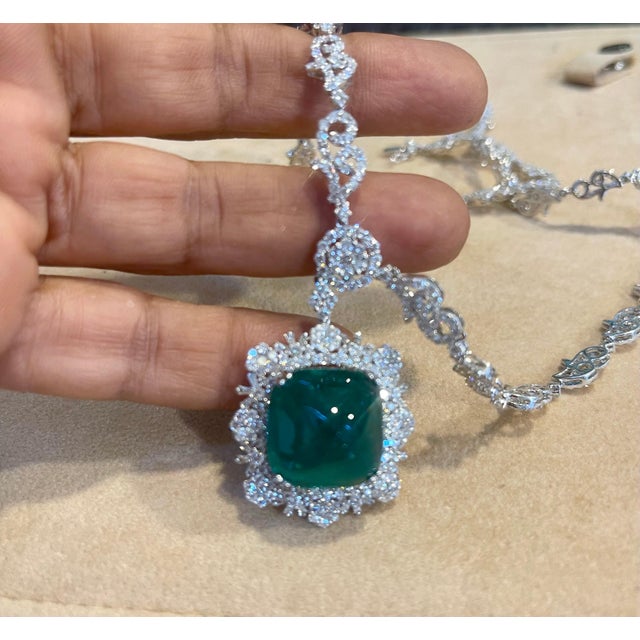 GIA certified GIA Report # 2221625145 Origin : Colombia Clarity F2 17 Carat Sugar Loaf Cabochon Colombian Emerald & 12...