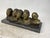 Beautiful bronze sculpture on a marble base, depicting five smiling faces of Neapolitan street urchins, by Vincenzo...