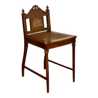 1920s French Louis XVI Style Caned Seat and Back Carved Oak Vanity Chair For Sale