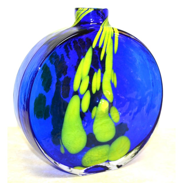 A large art glass vase made by CHLUM U TREBONE. The glass has a subtle texture and striking colors. Designed by 1974s Jan...