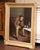 Brimming with personality and narrative charm, this antique genre painting is an original oil on canvas by listed Belgian...