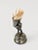A beautiful silver plated toothpick stand from the 1920s, displaying a boy at vintage in the wineyards. A very charming...