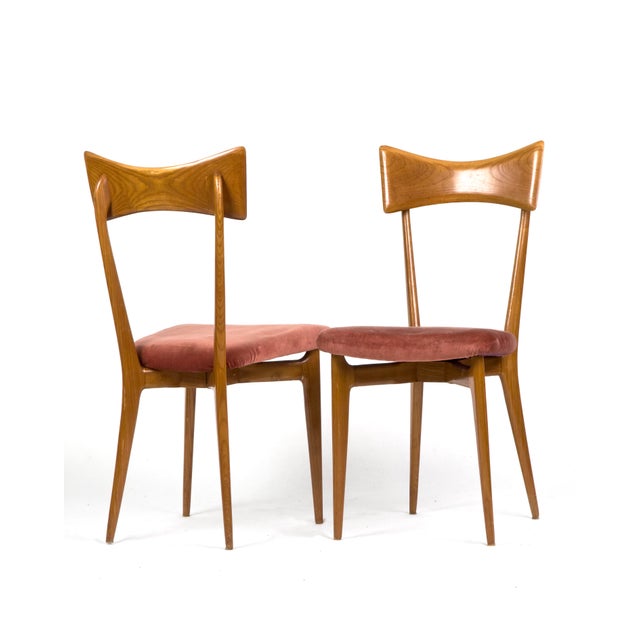 An elegant set of 6 “Bow-Tie” dining chairs designed by Ico Parisi and manufactured by Ariberto Colombo in Cantù. The...