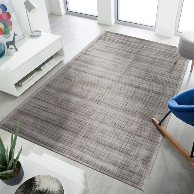 Sloane Maya Silver Handmade Rug, Country of Origin: India. This exceptional piece represents the finest contemporary...
