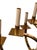22” across 29” tall This exquisite Mid-Century Modernist chandelier features a two-tier brass frame candelabra form design...