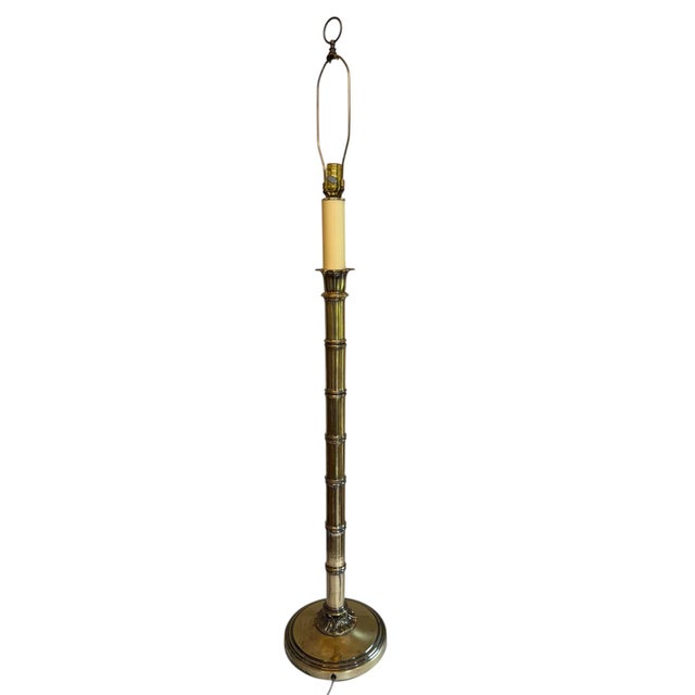 Ethan Allen Knob Creek Attributed Brass Bamboo Style Floor Lamp This visually intriguing floor lamp is comprised of a...