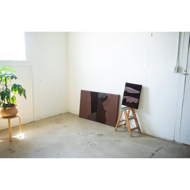 This diptych is 30 x 49 inches when hung together. Separately each piece is 30 x 24.5 inches. The layered leather on...