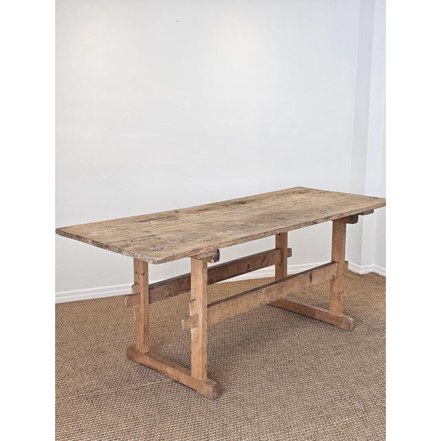Approximate Dimensions:&nbsp;31.75"D x 82.75"L x 32.75"H A beautifully timeworn antique European pine trestle table...