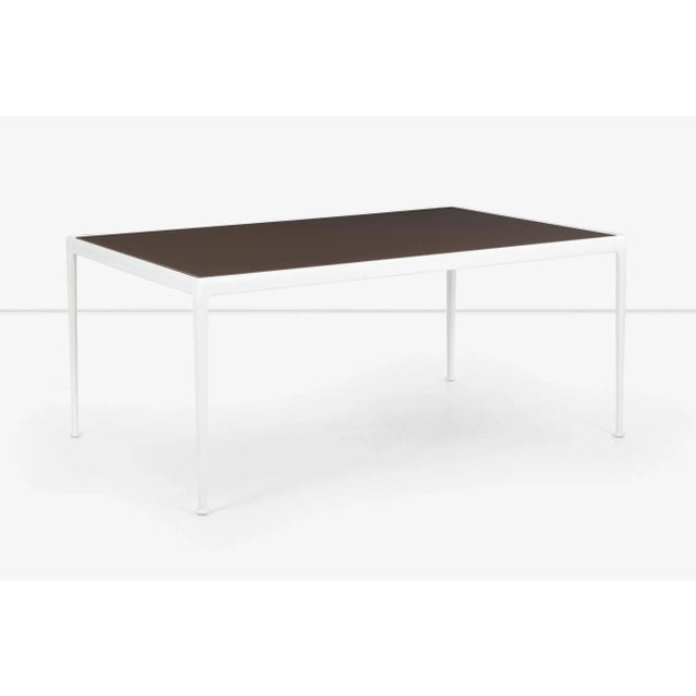 Early Richard Schultz Leisure Dining Table, painted aluminum base with inset brown enamel top. This height works well with...