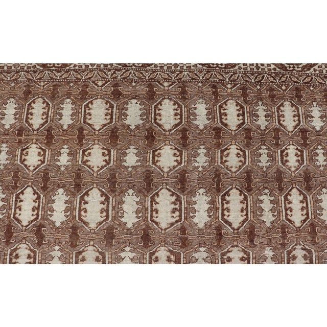 Turkish antique carpet from Turkey with sub-geometric pattern in shades of brown. Keivan Woven Arts / rug / EN-176556,...
