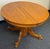 Beautiful vintage oak round pedestal dining table featuring a rich golden oak finish and stunning natural wood grain. The...