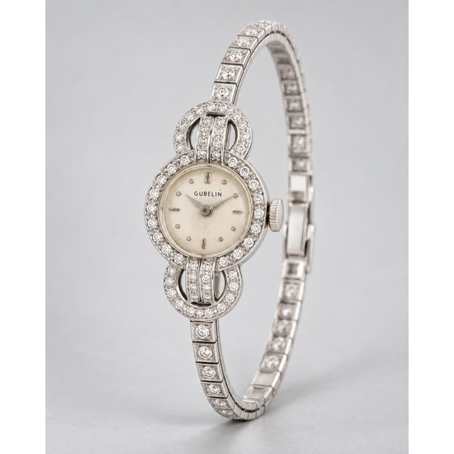 A breathtaking testament to mid-century high-society glamour and Swiss horological mastery, this Vintage Antique Gübelin...