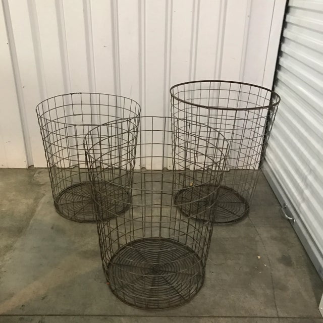 Three wire vintage baskets - each one is slightly lower than the others.