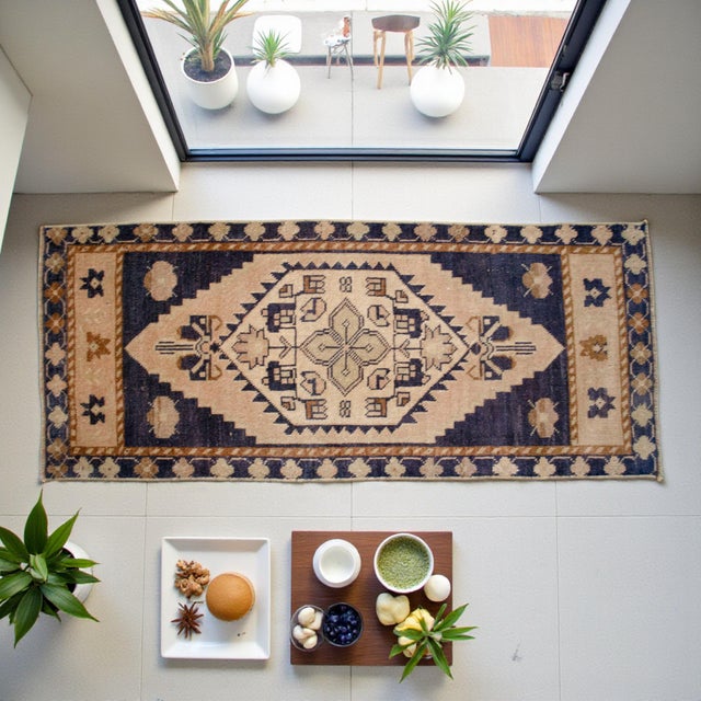 Vintage Turkish Hand-Knotted Small Rug Doormat from Oushak, 1970, featuring warm ivory tones and authentic village...