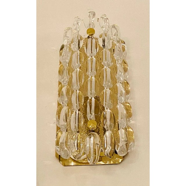 A set of 3 luxurious 1950s thick crystal bubble wall lights designed by Karl Fagerland for Orrefors. Rewired.