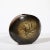 This powerfully scaled and materially gorgeous Mid-Century Modernist Ceramic Striated Burnt Umber Vase is signed by Aleph...