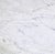 The teardrop-shaped top and the two legs are made of magnificent Carrara marble featuring a beautiful pattern. The...