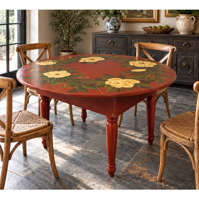 This Hand Painted Farmhouse Table is a memorable 57-inch round dining table transformed by a beautifully executed magnolia...