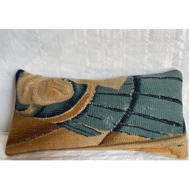 This rare decorative pillow is crafted from an authentic 17th century Flemish tapestry fragment, woven in wool by master...