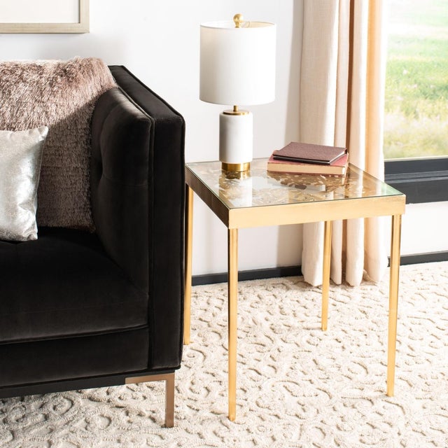 Inspired by the work of metalwork's master artisans, this stunning Leilani Side Table brings immediate savoir faire to the...