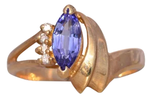 The Timp: Tanzanite and Natural Diamond Ring in Yellow Gold