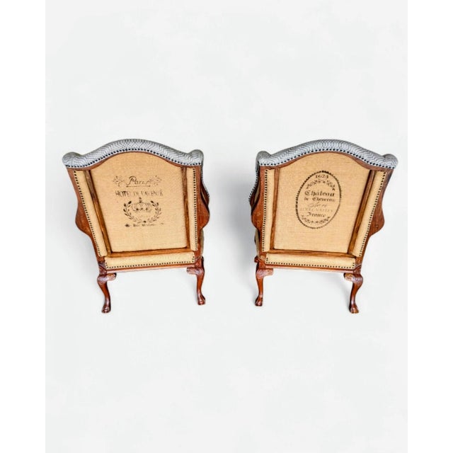 Set of enticing early 2000 vintage high-end C.R. Laine wingbacks refined in a deconstructed style with a high back and a...