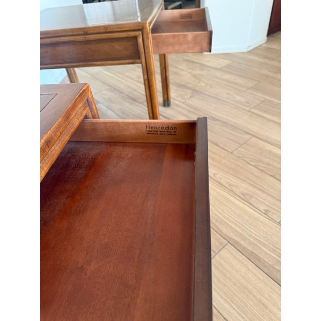 1970s Henredon side tables with brass pulls and sabots.