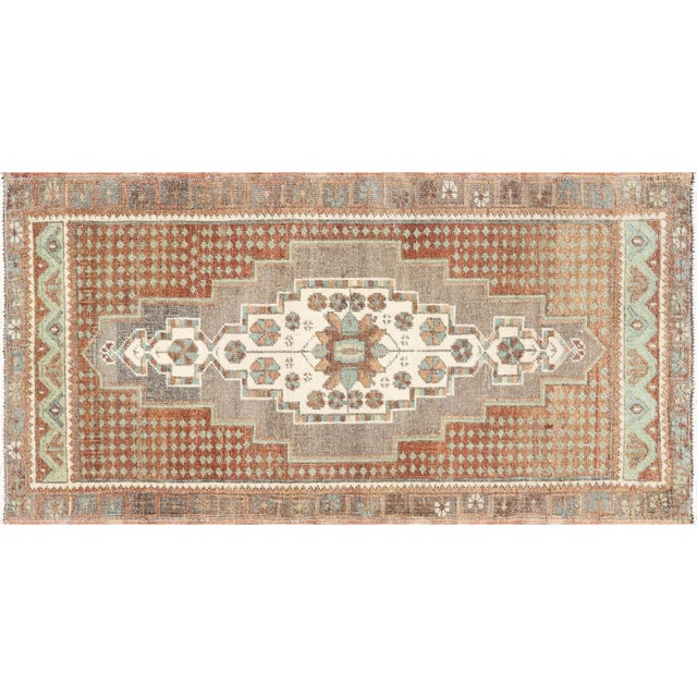 Expertly crafted and full of character, this Vintage Turkish Oushak Yastic rug measures 1'8" x 3'3". Made from high-...