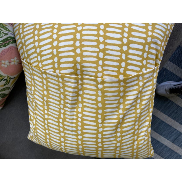 Happy yellow outdoor pillow covers. Inserts available: down or synthetic. Split sham like opening on back for insert. No...