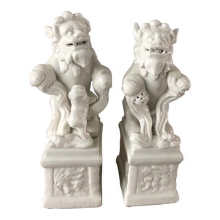 Mid 20th Century Blanc De Chine Ceramic Foo Dogs. A Most Lovely Dynamic Ceramic Duo in an Ivory Glaze-Set of 2 For Sale