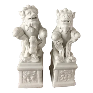 Mid 20th Century Blanc De Chine Ceramic Foo Dogs. A Most Lovely Dynamic Ceramic Duo in an Ivory Glaze-Set of 2